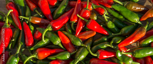 Canvas Print Large crop of red and green hot chili peppers