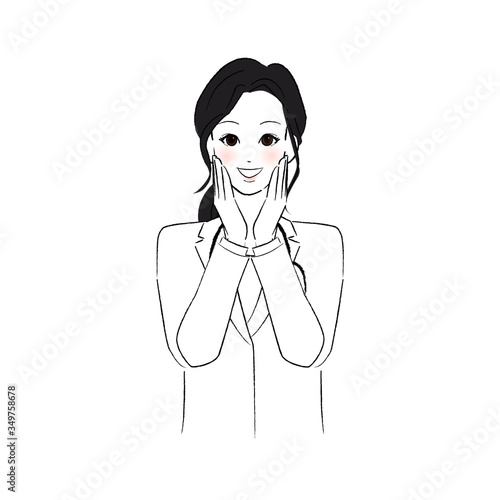 頬に両手を添える女性医師