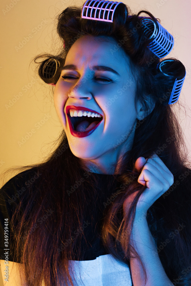 Portrait of a girl with a creative hairstyle in neon light (soft light)