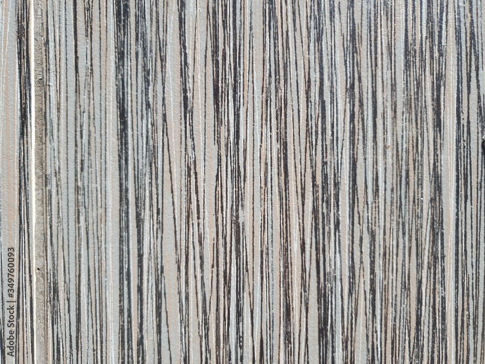 Fototapeta premium vertical brown and black lined pattern background texture on wall material