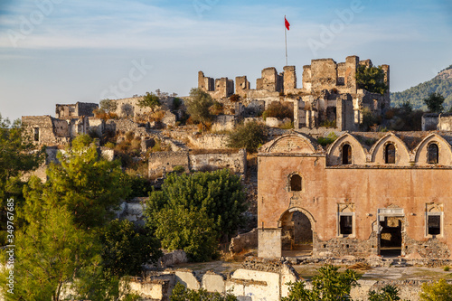 Ruins of the former Greek village, now called Kayakoy, Turkey photo