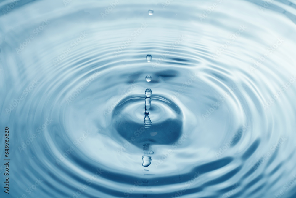 The surface of water droplets, blue water waves The surface of water droplets, blue water waves