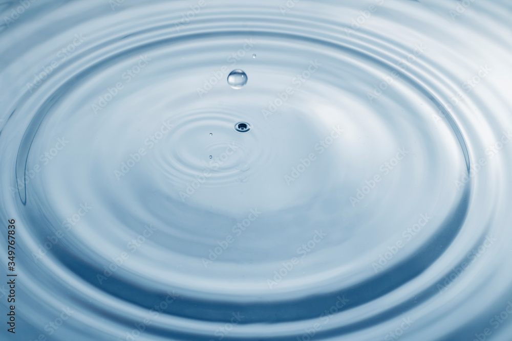 The surface of water droplets, blue water waves The surface of water droplets, blue water waves