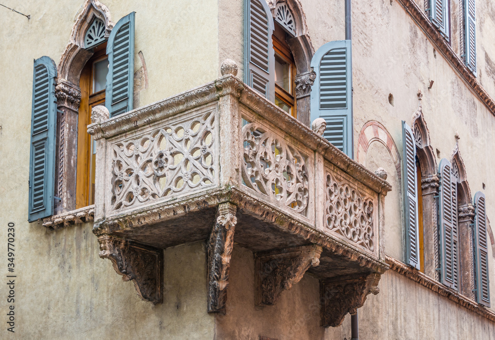 characteristic balcony of a historic building in Verona in a historic center, northern Italy
