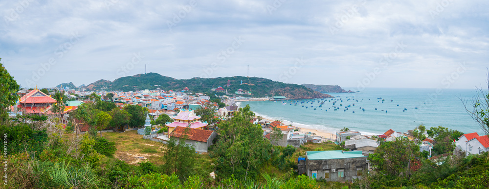 Xuong Ly fishermen village on turquoise water coastline, awesome bay near Quy Nhon, Vietnam central coast travel destination, expansive view