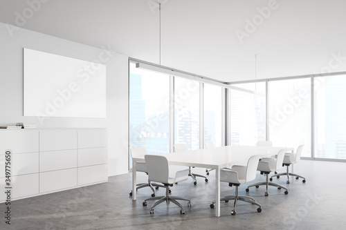 White meeting room with horizontal poster