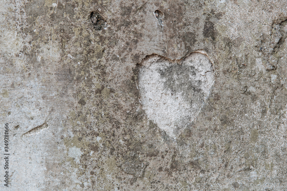 The shape of a heart on a concrete wall The shape of a heart on a concrete wall