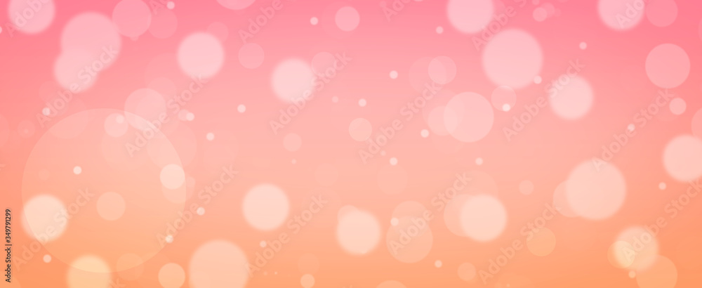 Glowing soft orange and pink circles.  Spring concept.  Blurred bokeh circles.  Website banner.  Celebration.