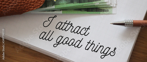 Fotografie Text showing I Attract All Good Things and 100 Euro banknotes Positive attractio