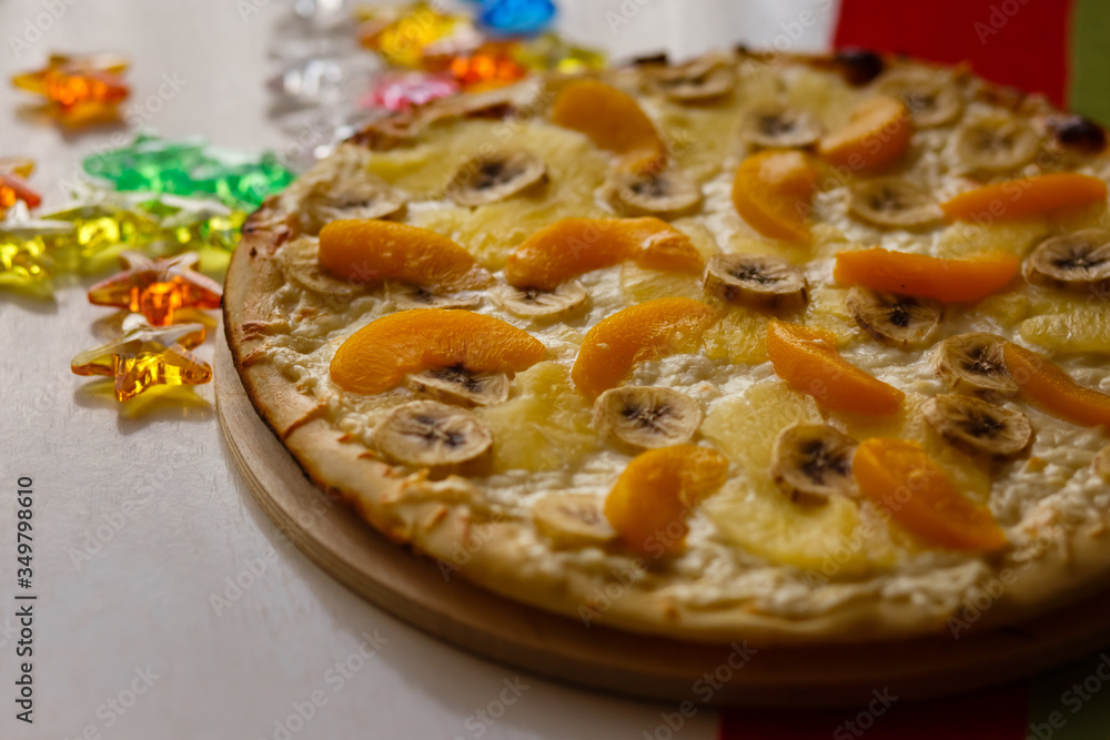 Sweet fruit pizza - bananas, peaches, oranges Sweet fruit pizza - bananas, peaches, oranges