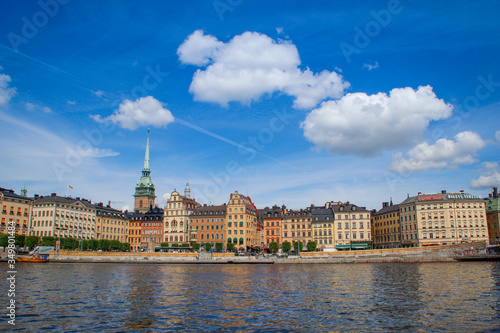 center of the Scandinavian capital of Stockholm with smooth bay water, promenade, yachts and houses. Scandinavian architecture of cities. © Tanya Hendel