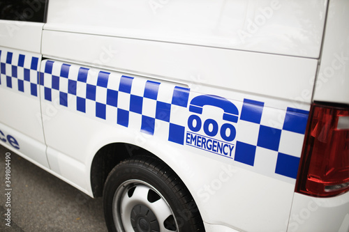 emergency number triple zero on an australian poice van