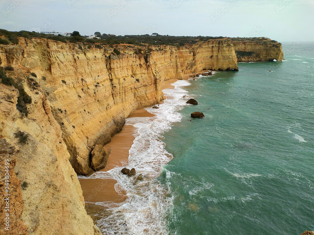 cliffs in the sea in portugal algarve cliffs in the sea in portugal algarve