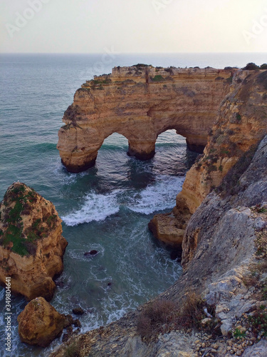 cliffs in the sea in portugal algarve © Elena Kharichkina