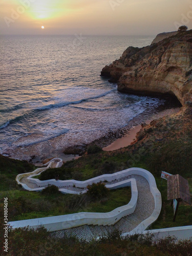 sunset in the sea in portugal algarve photo