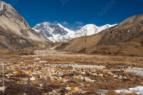 Himalaya mountains landscape and meadow a long the way to Amphulapcha base camp, Everest region in Nepal photo