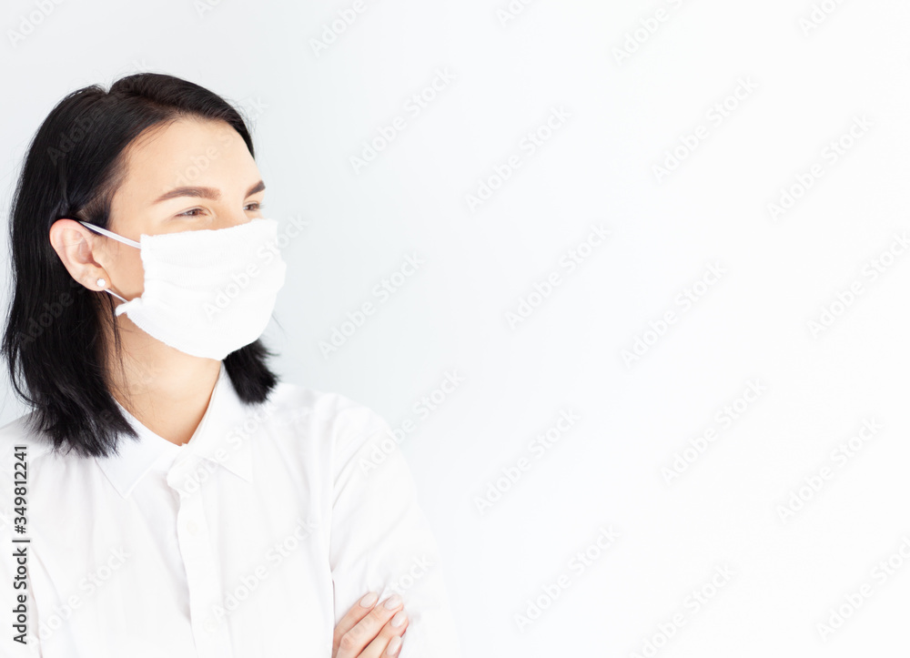 woman in medical mask on a white background woman in medical mask on a white background