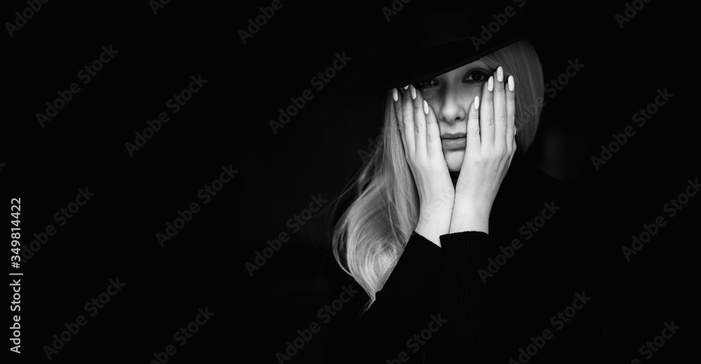 Psychology dramatic photo of Woman on black background. Psychology dramatic photo of Woman on black background.