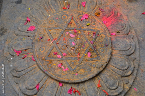 Lalitpur Nepal - Patan Durbar Square Shiva Shakti Hexagram stone carving photo