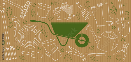 Affiche ou bannière avec divers outils de jardinage en tracé blanc et une brouette verte sur un fond papier craft.