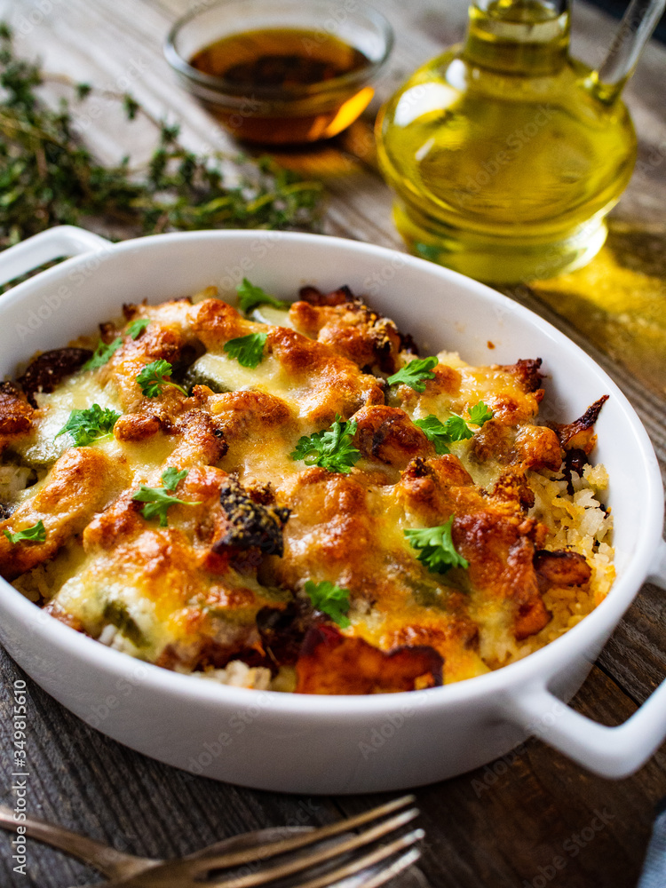 Rice casserole with barbecue chicken breast, cheese and vegetables
Rice casserole with barbecue chicken breast, cheese and vegetables