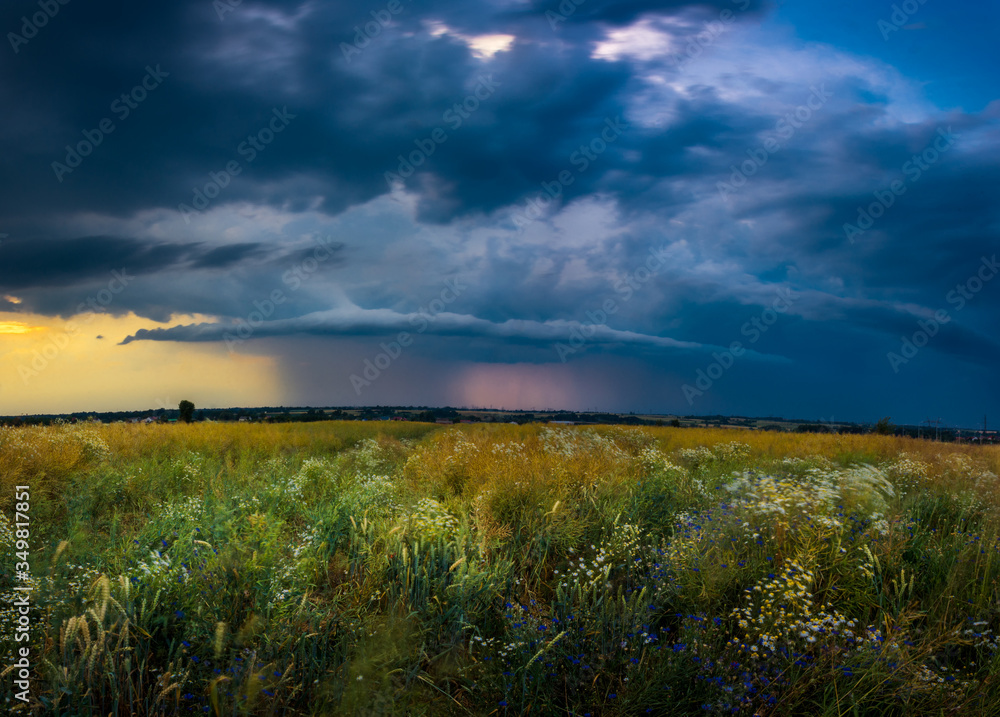 storm clouds over the field