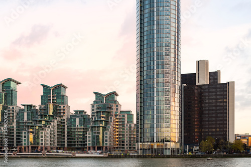 Stunning view of the St George Wharf area illuminated by a beautiful sunset. St George Wharf is a riverside development in Vauxhall, Lambeth, London, England. photo