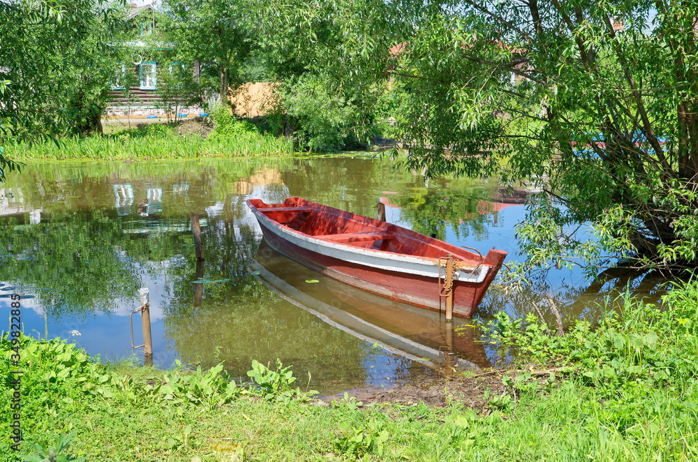 Pereslavl-Zalessky, Yaroslavl region. Boat at the Bank of the Trubezh river. Golden ring of Russia