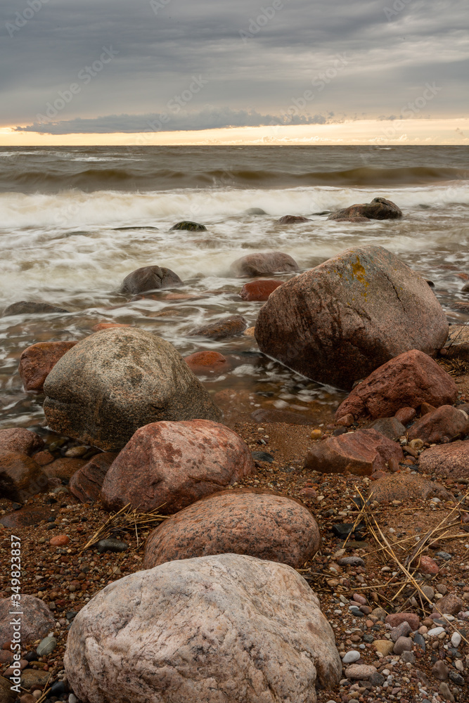 City Tuja, Latvia. Baltic sea with rocks and sand. Travel photo. City Tuja, Latvia. Baltic sea with rocks and sand. Travel photo.