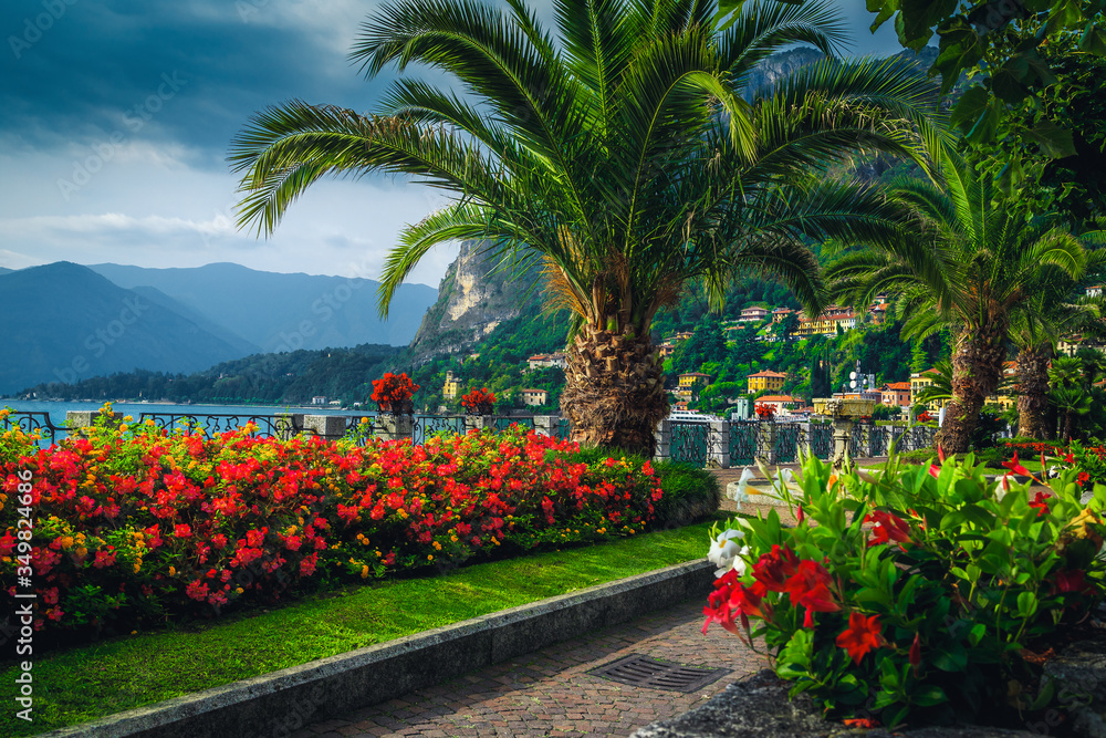Picturesque promenade with colorful flowers, Lake Como, Menaggio, Lombardy, Italy