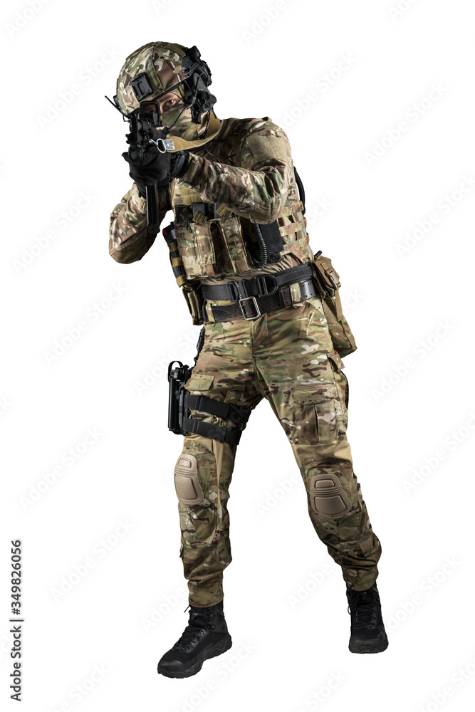 Soldier holding assault rifle. Uniform conforms to special services of the Russian Federation. Shot in studio. Isolated with clipping path on white background Soldier holding assault rifle. Uniform conforms to special services of the Russian Federation. Shot in studio. Isolated with clipping path on white background