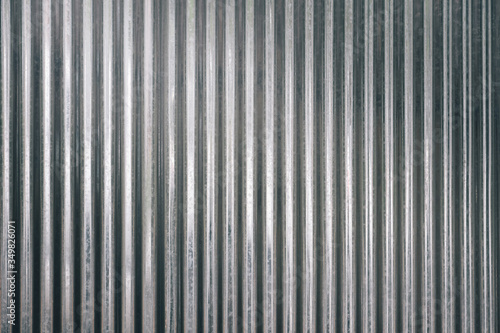 corrugated galvanized sheet texture background with light from above