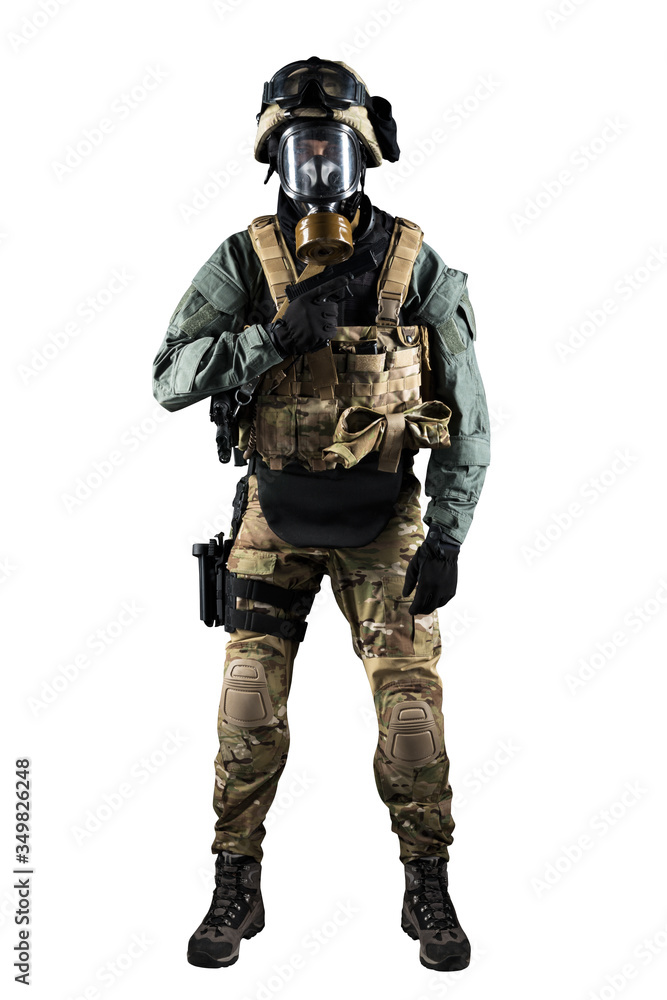 Soldier holding assault rifle. Uniform conforms to special services of the Russian Federation. Shot in studio. Isolated with clipping path on white background Soldier holding assault rifle. Uniform conforms to special services of the Russian Federation. Shot in studio. Isolated with clipping path on white background