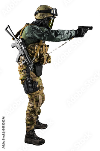 Soldier holding assault rifle. Uniform conforms to special services of the Russian Federation. Shot in studio. Isolated with clipping path on white background
