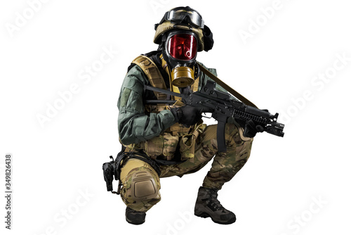 Soldier holding assault rifle. Uniform conforms to special services of the Russian Federation. Shot in studio. Isolated with clipping path on white background