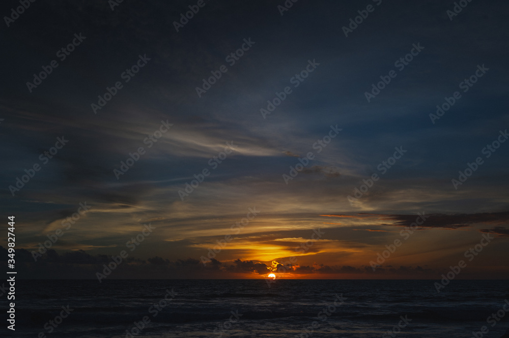 Magical dramatic sunset on a tropical beach. Magical dramatic sunset on a tropical beach.