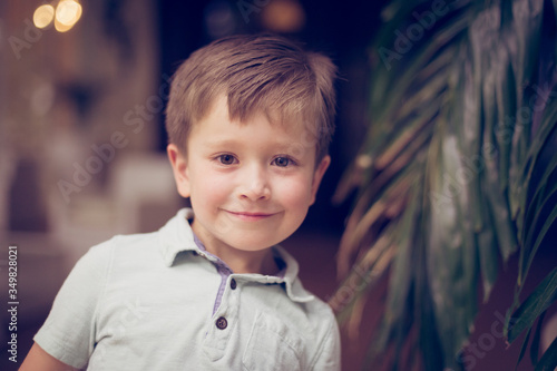 Jamaica with pamltrees, Young boy smiling