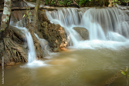 Waterfall in the jungle of central region Thailand. Low shutter speed stream.
