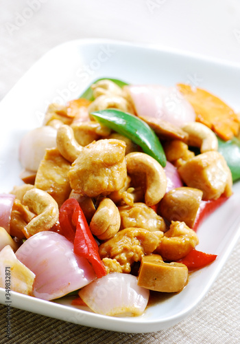 Asian style stir fried chicken with peppers and cashew nuts