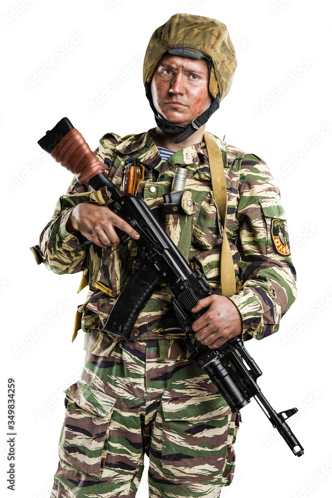 Male in uniform conforms to Russian army special forces (OMON) in War in Chechnya. Isolated on white background Male in uniform conforms to Russian army special forces (OMON) in War in Chechnya. Isolated on white background