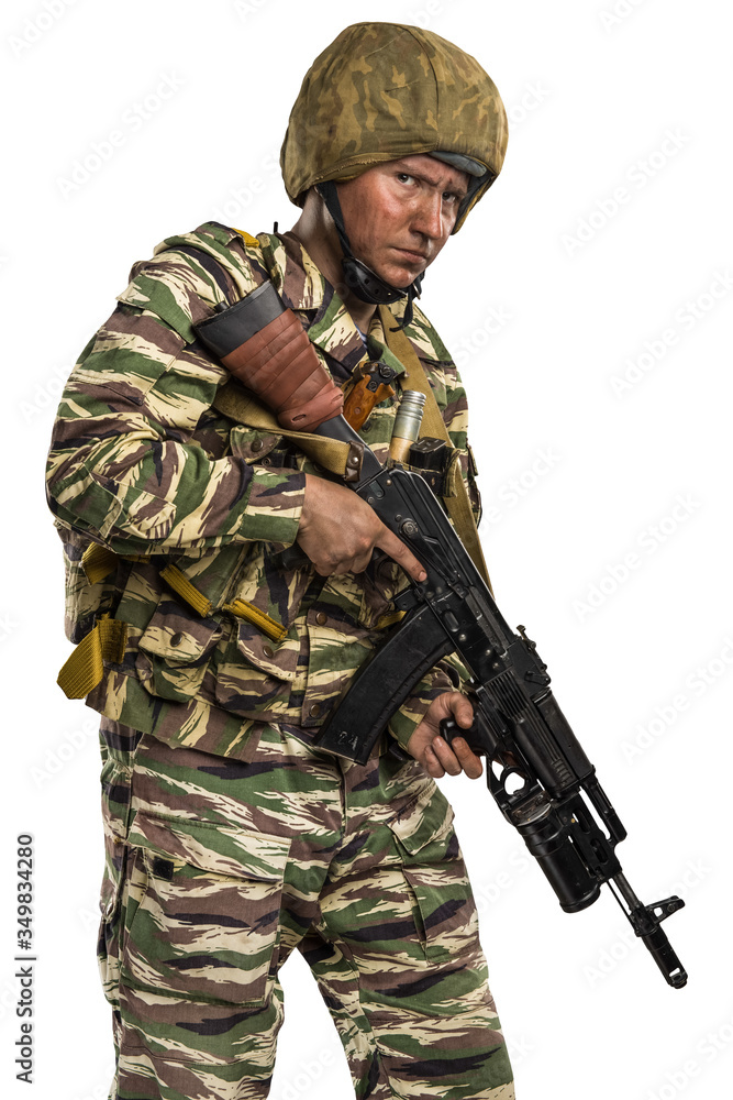 Fototapeta premium Male in uniform conforms to Russian army special forces (OMON)&nbsp;in War in Chechnya. Isolated on white background