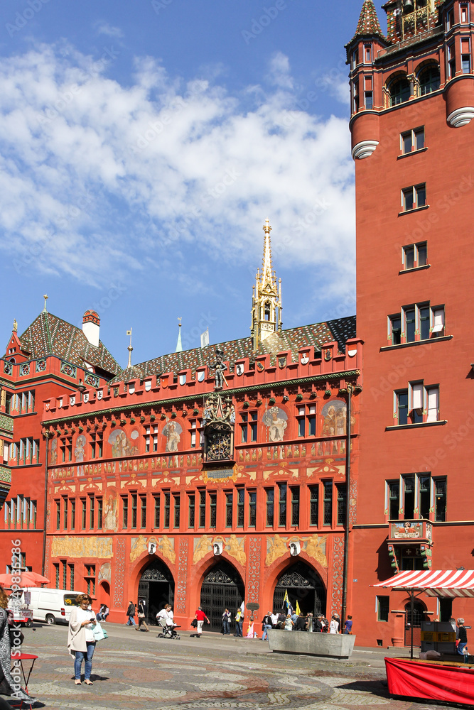 Basel, Switzerland: September 10, 2015: Basel Town Hall -the seat of the Basel government and its parliament. It is well-known for its colorfully decorated facade.