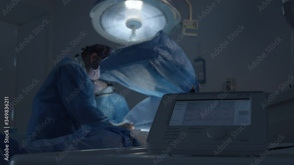 The surgeon performs an operation to install a pacemaker in the general ...