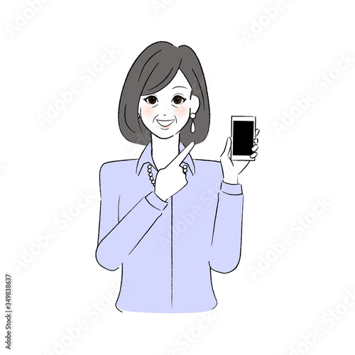 スマホを指差すシニア女性