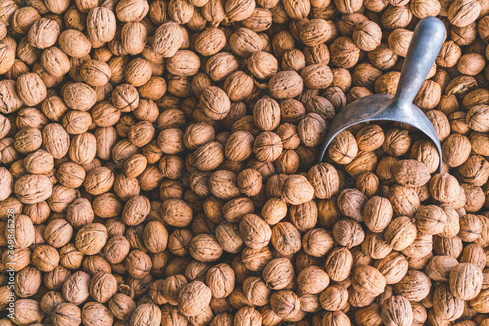 Pile of walnuts.in farmer shop,Agriculture background. Pile of walnuts.in farmer shop,Agriculture background.