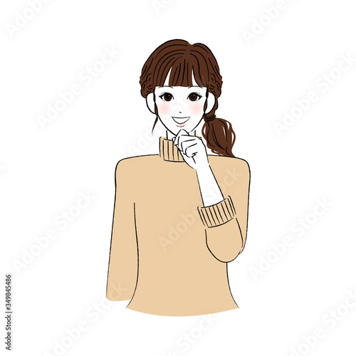 あごに手をあてて微笑む女性