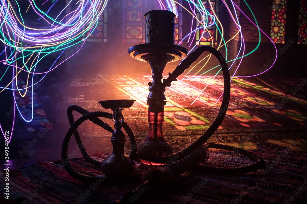 Hookah hot coals on shisha bowl with black background. Stylish oriental shisha. Shisha Concept