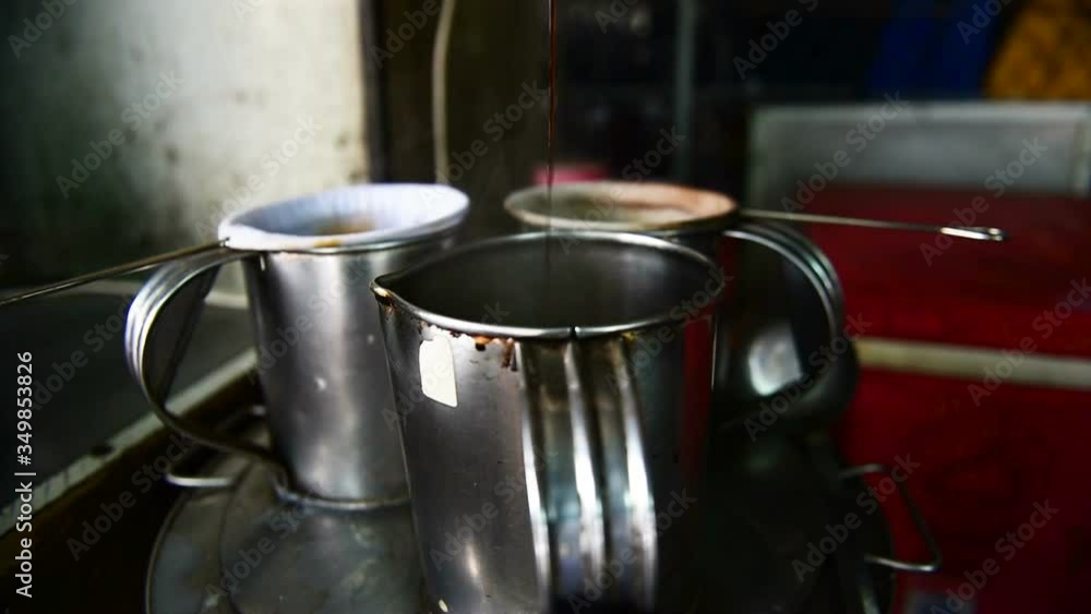 merchants making coffee on his small shop in the countryside Market merchants making coffee on his small shop in the countryside Market