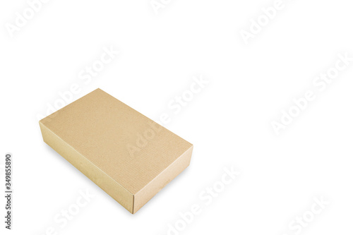 Paper box isolated on white background, Delivery products Packaging recycling concept, Perspective view. © Danai