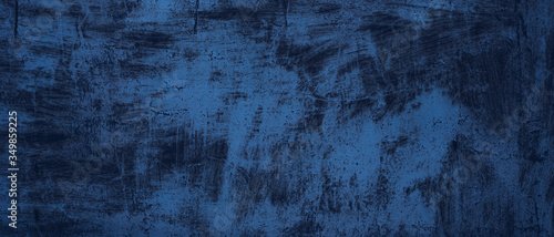 Blue texture background. Rough dark metal with rust